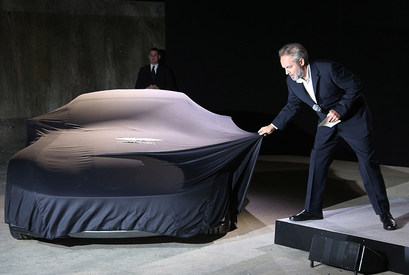 Director Sam Mendes unveils the Aston Martin DB10 at the announcement for the new James Bond film, the 24th in the series, at Pinewood Studios in west London. (AP)