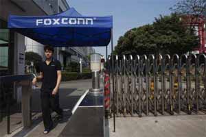 Workers threaten to launch protest if Foxconn stops operations