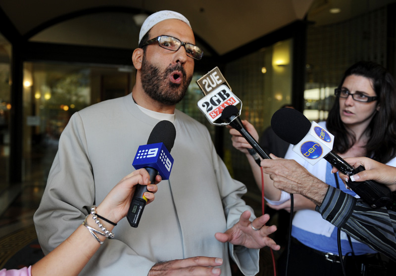 A file photo of man Haron Monis, believed to be the gunman inside the Sydney's Lindt Cafe in Martin Place, speaks to the media as he leaves the Downing Centre in Sydney after a pre-trial hearing.