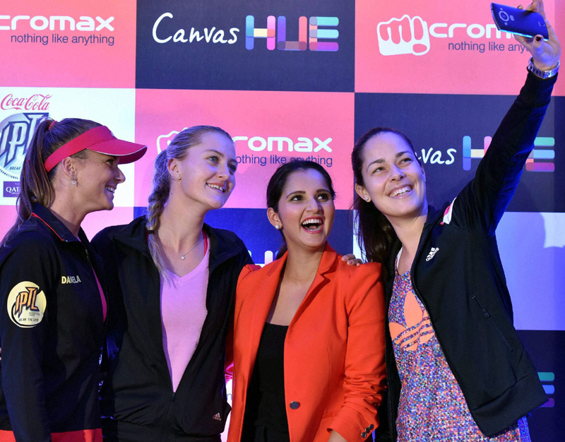 Tennis Champions Daniela Hantuchová, Ana Ivanovic, Sania Mirza and Kristina Mladenovic take selfies with the newly launched Micromax Canvas Hue. (PTI)