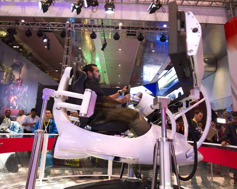 Thomas Bustos, a technology manager at the University of California, Merced, tries out a driving simulator in a Ford booth during the 2015 International Consumer Electronics Show (CES) in Las Vegas, Nevada. (Reuters)