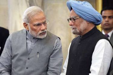 Prime Minister Narendra Modi, Former Prime Minister Manmohan Singh during a banquet hosted in the honour of Sri Lanka’s President Maithripala Sirisena at the Rashtrapati Bhavan in New Delhi on Monday night. PTI Photo by Manvender Vashist