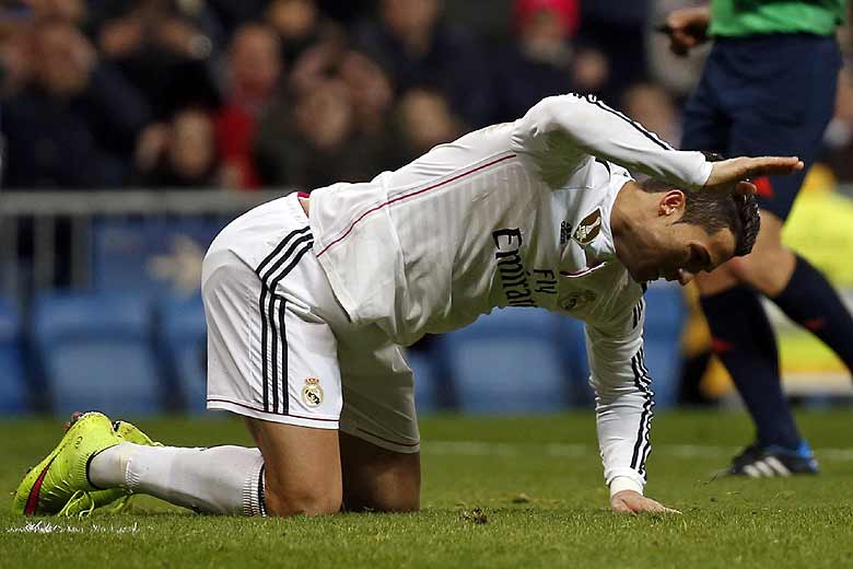 Real Madrid's Cristiano Ronaldo reacts after a missed scoring opportunity against Deportivo Coruna during their Spanish first division soccer match at Santiago Bernabeu stadium in Madrid, February 14, 2015. (Reuters)