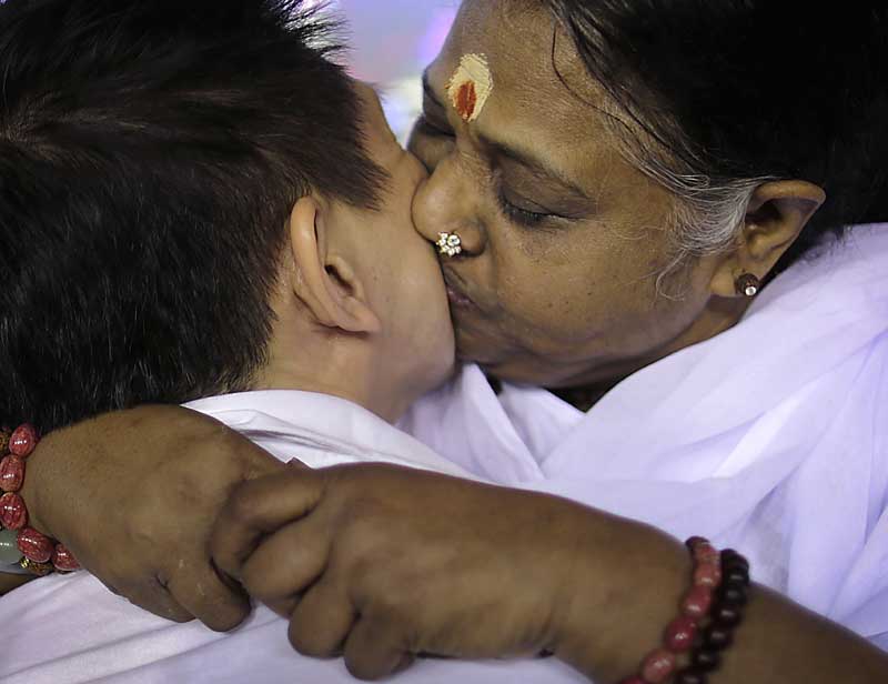 Mata Amritanandamayi, Mata Amritanandamayi, amma, Singapore, Amritanandamayi, India, Brazil, Switzerland
