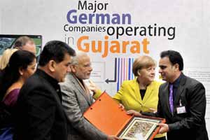 narendra modi news, Narendra Modi, PM Narendra Modi, industrial fair Hannover, Germany industrial fair, Prime Minister Narendra Modi, Angela Merkel, germany, narendra modi in germany, india news, world news
