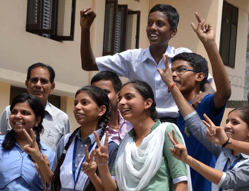 PSEB class 10th result: 2nd topper with the the sports marks of PSEB class ten Shivam Kumar (center) lifted by the jubilaint students at BCM Senior Sec. Schhol at Jamalpur in Ludhiana. Express Photo by Gurmeet Singh) </br> According to PSEB’s official site, 3,53,327 regular students appeared for the exam, out of which 2,42,406 students passed. The number of students who enrolled through open schools is 25,772 and only 6,916 students from this lot passed the exam.</br><br><strong>Read full story:</strong> <a href="https://www.financialexpress.com/article/industry/jobs/cbse-class-10-result-2015-to-be-announced-today-may-28-board-confirms/77111/"><strong>CBSE class 10 result 2015 announced, click here to check your result</strong></a></br><strong>Photos:</strong> <a href="https://www.financialexpress.com/photos/business-gallery/75526/cbse-10th-result-2015-how-to-calculate-cgpa/"><strong>How to calculate percentage from CGPA</strong></a></br><strong>CBSE class 10 result:</strong> <a href="https://www.financialexpress.com/article/industry/jobs/cbse-10th-result-2015-announced-on-may-27-all-you-need-to-know-about-10th-board-exams/76280/"><strong>Top 10 frequently asked questions</strong></a></br><strong>Also read:</strong> <a href="https://www.financialexpress.com/article/industry/tech/cbse-class-10-result-first-smartphone-app-that-can-predict-your-grades/76798/"><strong>First smartphone app that can predict your grades</strong></a>