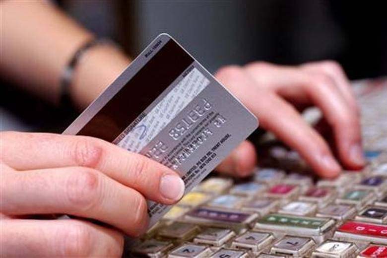 Try to use credit cards that offer added advantages like cash back and reward points. (Reuters)