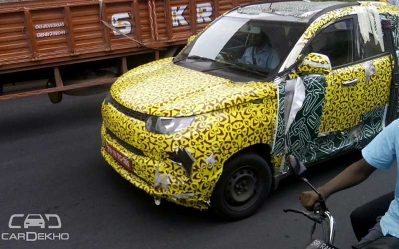 1. Mahindra S101 </br> A test mule of Mahindra’s upcoming S101 was spotted making rounds on the roads of Chennai. The car was out on a road-test, wrapped in camouflage. By the looks of it, one can deduce that the car was sporting a silver color scheme, which might be one of the colors in which the car will be offered. Mahindra will probably introduce S101 this fiscal year. The car is being categorized as a sub-compact crossover and will be Mahindra’s second monocoque-based product following TUV300. (Image: CarDekho)