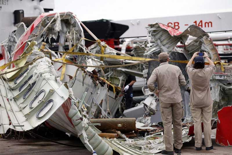 AirAsia crash, AirAsia investigation, AirAsia crash report, AirAsia crash reason, airasia crash photos, AirAsia Flight QZ8501 update