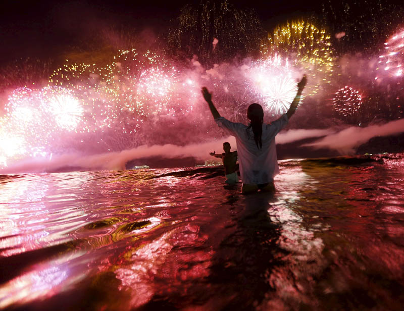 7. A couple watched as fireworks exploded over Copacabana beach during New Year celebrations in Rio de Janeiro, Brazil. (Reuters photo)