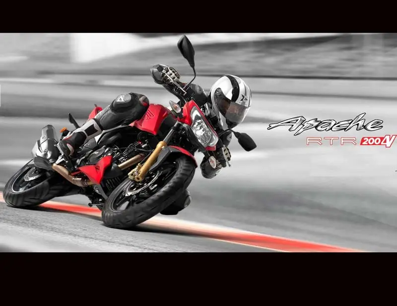 Features - With new headlight cluster, clip-on handlebars, upward riding stance, new alloy wheel design, the new Apache RTR 200 4V looks quite aggressive and sporty. What further enhances its appeal is sporty black finish on the engine, upside down fork with golden metallic colour, fuel tank with extensions, split seats, revised exhaust with twin mufflers and mud guards. There is an all-digital instrument cluster consisting of a tachometer and a large red rev-limiter light.