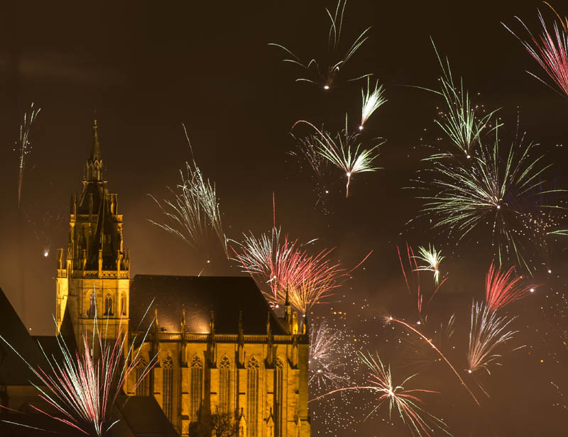 6. Fireworks exploded near the medieval Mariendom or St. Mary's Cathedral shortly after midnight during the New Year celebrations in Erfurt, central Germany. (AP Photo)