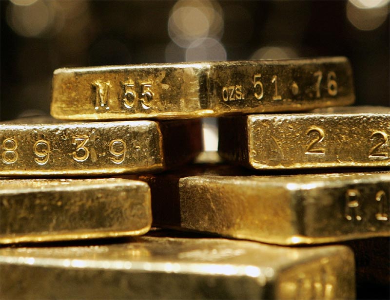 2. Why should I buy Sovereign Gold Bond Scheme rather than physical gold? What are the benefits? The quantity of gold for which the investor pays is protected, since he receives the ongoing market price at the time of redemption/ premature redemption. The SGB offers a superior alternative to holding gold in physical form. The risks and costs of storage are eliminated. Investors are assured of the market value of gold at the time of maturity and periodical interest. SGB is free from issues like making charges and purity in the case of gold in jewellery form. The bonds are held in the books of the RBI or in demat form eliminating risk of loss of scrip etc. (Image Source: Reuters)