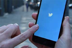 Twitter's location-reporting service is off by default, but many Twitter users choose to activate it. (AP)