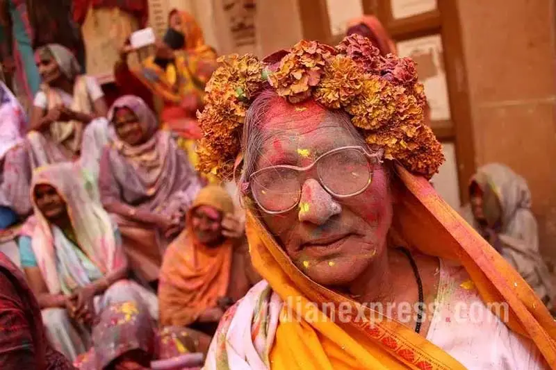 The country's millions of observant Hindu widows are expected to live out their days in quiet worship, dressed only in white. They are typically barred from all religious festivities because their very presence is considered inauspicious. (Source: Express photo by Ravi Kanojia)
