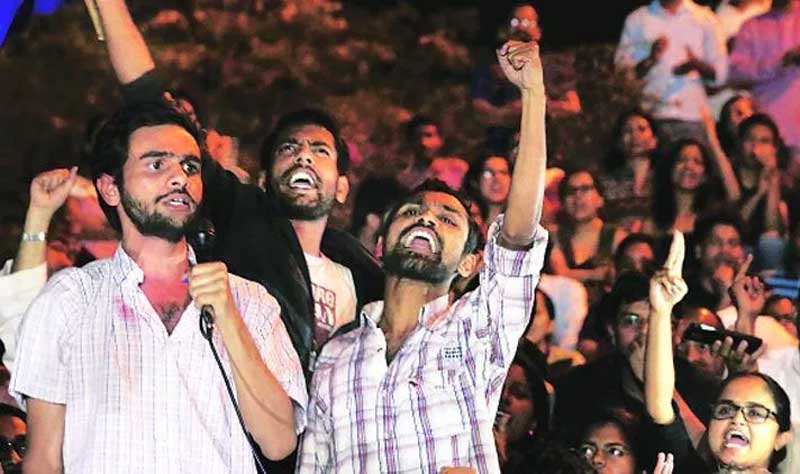 Umar Khalid and Anirban Bhattacharya at JNU Friday night, following their release from custody. Express Photo by Ravi Kanojia.
