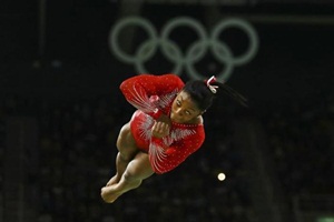 Rio Olympics 2016: Biles -- a gold medallist in the team, all-around and vault in Rio -- fought to stay on the apparatus during her routine, scoring just 14.733 points. (Source: Reuters)