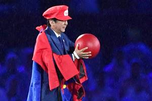Japanese Prime Minister Shinzo Abe appears as the Nintendo game character Super Mario during the closing ceremony at the 2016 Summer Olympics in Rio de Janeiro, Brazil. Abe's brief but show-stopping appearance as Super Mario offered a glimpse at Tokyo's plans for the 2020 games. (AP)