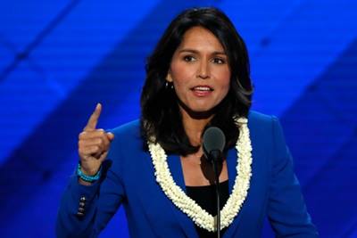 Democrat Tulsi Gabbard, a major in the Army National Guard, told CNN that she met with Assad during a secret "fact-finding" trip she took to the country. (Reuters)