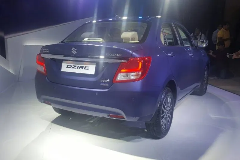 Safety: The safety features will consist of ABS (Antilock braking System), EBD (Electronic Brakeforce Distribution) and dual front airbags as standard. In addition of the standard safety features, the new Maruti Suzuki Dzire is also compliant with frontal offset and side impact protection along with door ajar warning light and seat belt warning audio alarm.