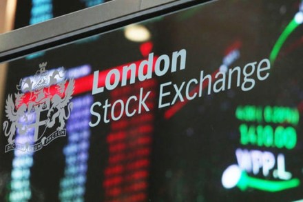 FTSE hovers near record level, mid-caps surge higher as earnings impress