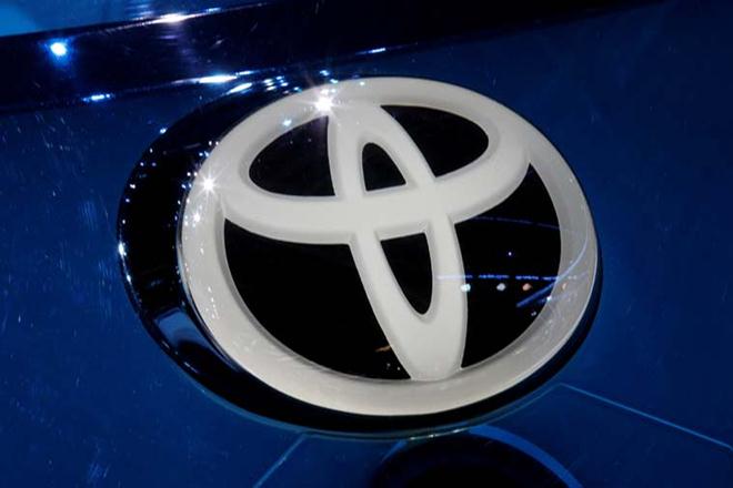 Toyota says annual profit drops 21%, first fall in five years