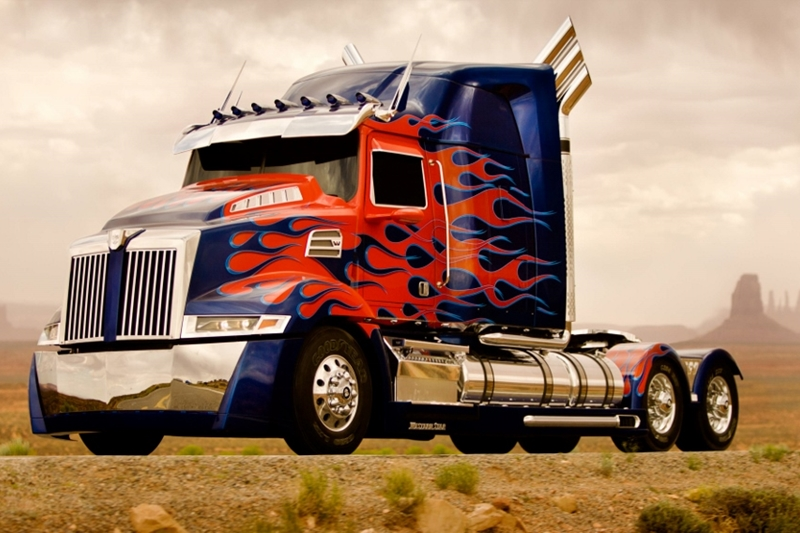 Optimus Prime the had-been leader of the Autobots is a part of the movie, but we’ll keep his agenda out of this gallery in the interest of spoilers. He will return in the ‘murrrica red and blue Western Star 5700, switching out of the Peterbilt guise that he had for the first three movies. But purely automotively speaking his contribution is fair at best.