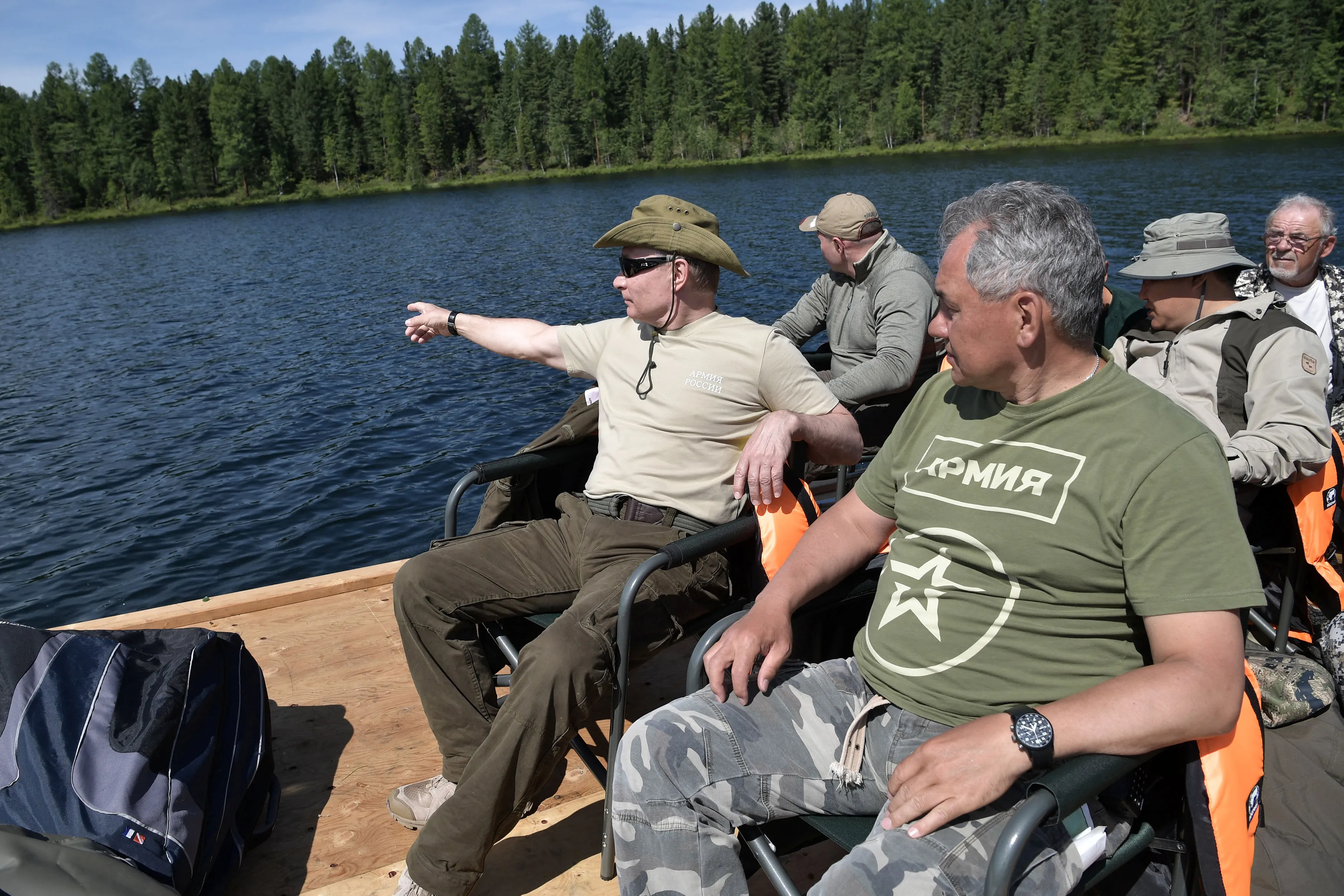 Vladimir Putin, Vladimir Putin holiday, putin holiday, shirtless putin, hunting fish, Siberia