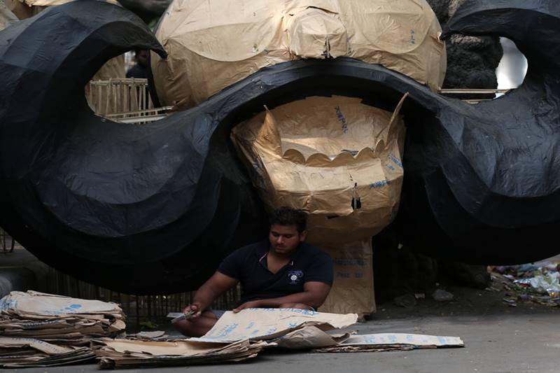 A craftsmen of creating Ravana effigies at Titarpur in West Delhi. (Express Photo By Amit Mehra)