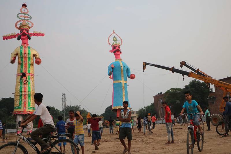 Final preparations going on for installation of effigies of Ravan, Kumbhkaran and Meghnath at Dussehra ground in Sector 46 of Chandigarh. (Express Photo by Kamleshwar Singh)