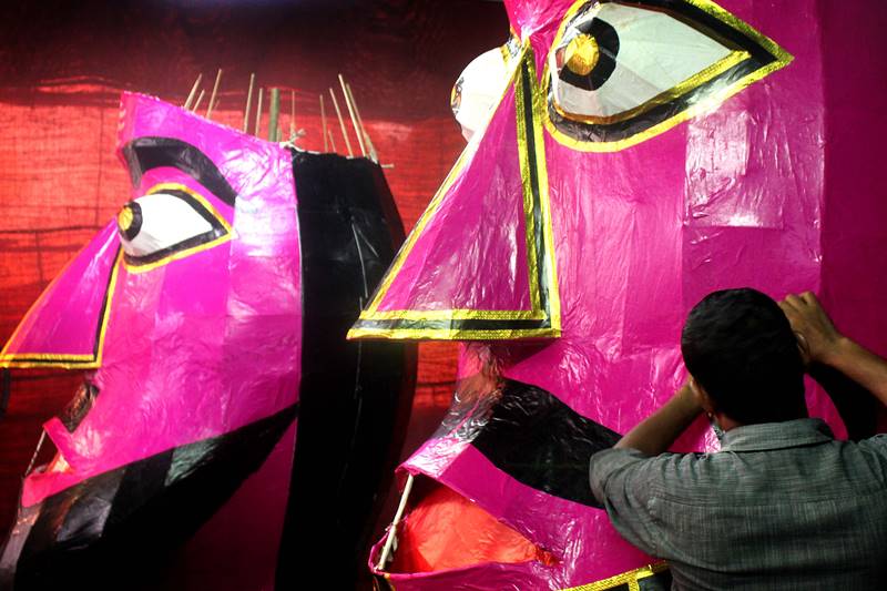 Preparation of Ravan effigy’s for Dashara celebration at Girgaon Chawpatty on Tuesday. (Express photo by Ganesh Tendulkar)