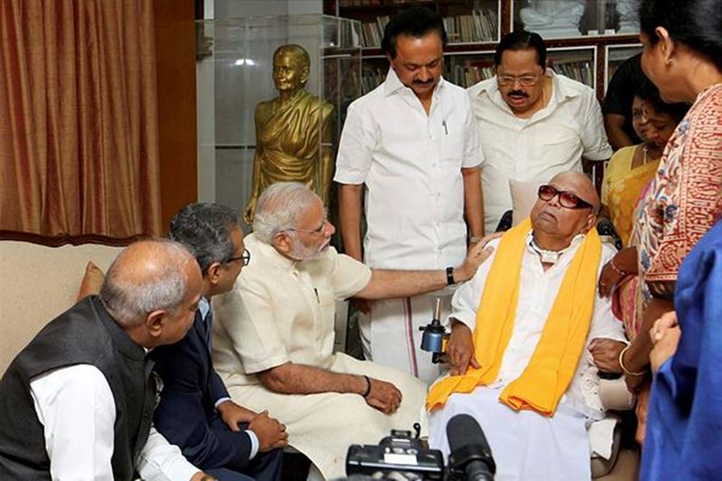 PM Narendra Modi visits DMK chief M Karunanidhi, PM Narendra Modi visits DMK chief M Karunanidhi 2017, Gopalapuram residence in Chennai, Modi sat next to Karunanidhi and held his hands, Governor Banwarilal Purohit, Chief Minister Palaniswami, DMK Working President M K Stalin, ailing party president M Karunanidhi