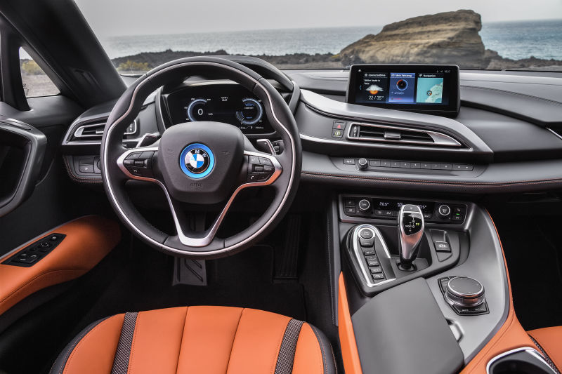 The interiors carry forward the Sci-Fi theme, although the orange and black theme on the roadsters interiors do look the part. The infotainment system which sticks out from the dash, doubles up to give you all the tech inputs that you might need like range, battery and power usage.