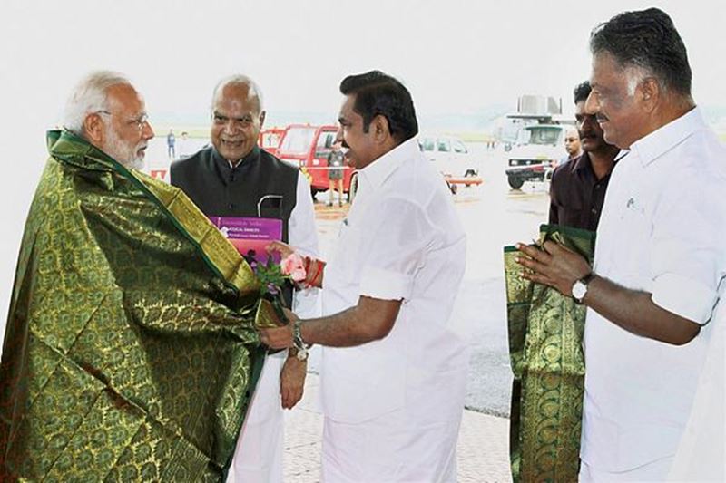 PM Narendra Modi visits DMK chief M Karunanidhi, PM Narendra Modi visits DMK chief M Karunanidhi 2017, Gopalapuram residence in Chennai, Modi sat next to Karunanidhi and held his hands, Governor Banwarilal Purohit, Chief Minister Palaniswami, DMK Working President M K Stalin, ailing party president M Karunanidhi