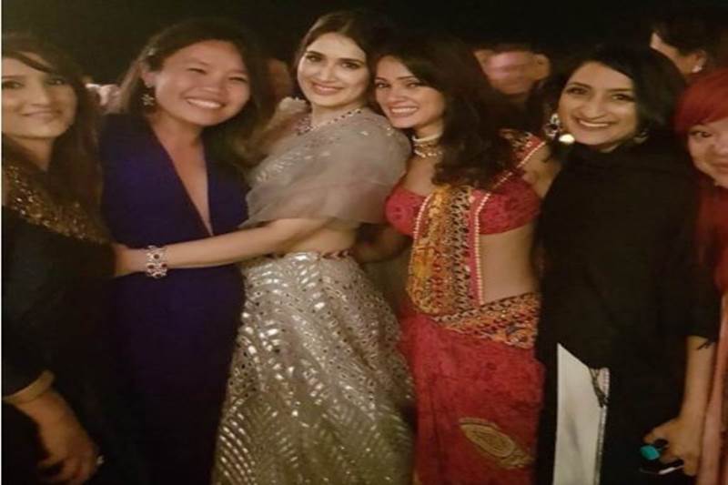 The girl gang of Chak De India re-united for the dancing night organised by the newly-wed couple. Sagarika Ghatge's close friend and actor Vidya Malavade looked amazing in her red saree. (Source: IE)