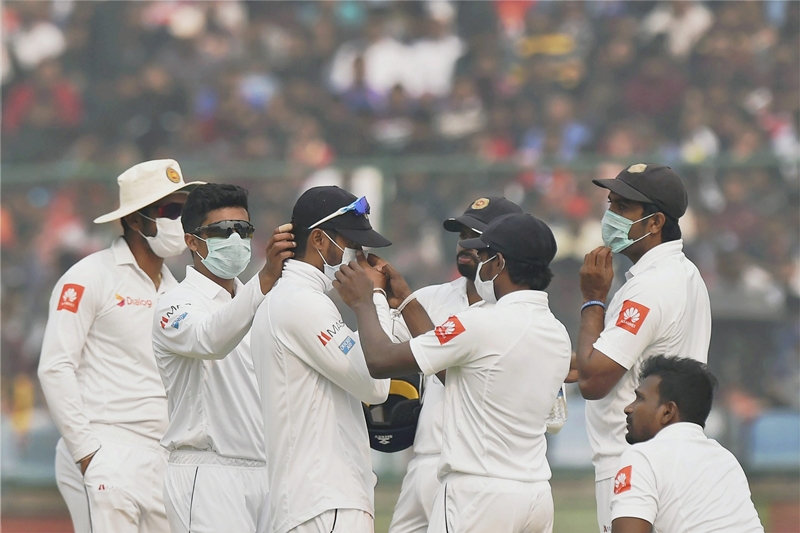 India vs Sri Lanka Highlights, virat kohli double century, sri lankan players halt play, sri lankan players wear masks, india vs sri lanka test disrupted, smog hit india vs sri lanka test