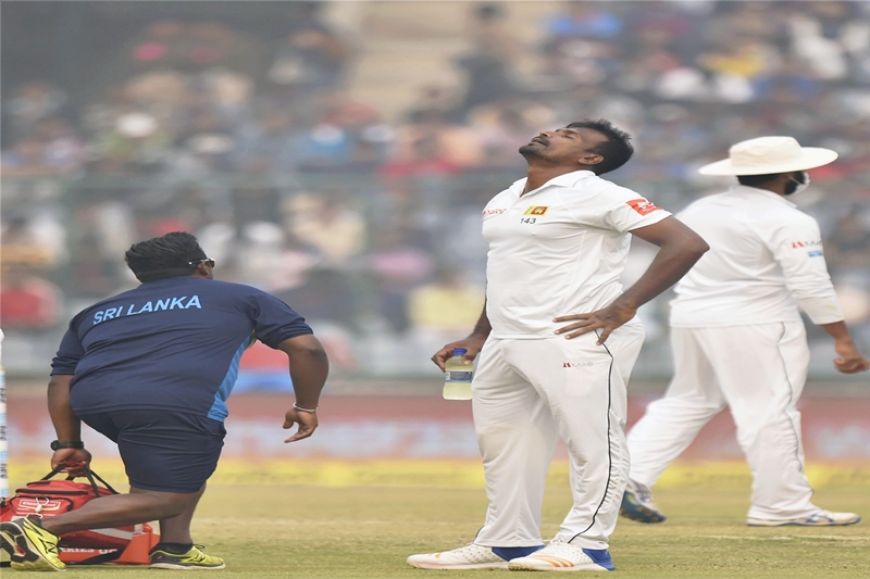 India vs Sri Lanka Highlights, virat kohli double century, sri lankan players halt play, sri lankan players wear masks, india vs sri lanka test disrupted, smog hit india vs sri lanka test