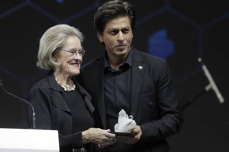 Bollywood superstar Shahrukh Khan is at the World Economic Forum (WEF) summit to receive the Crystal award along with Blanchett and legendary musician Elton John. Receiving the award, Khan applauded Blanchett -- who was honoured with the award just before him -- for being the queen of billions of hearts, including his own. He talked extensively about his social initiative, which he has named after his father, and the reason for the same. Let us take a look at some of the images from the summit: