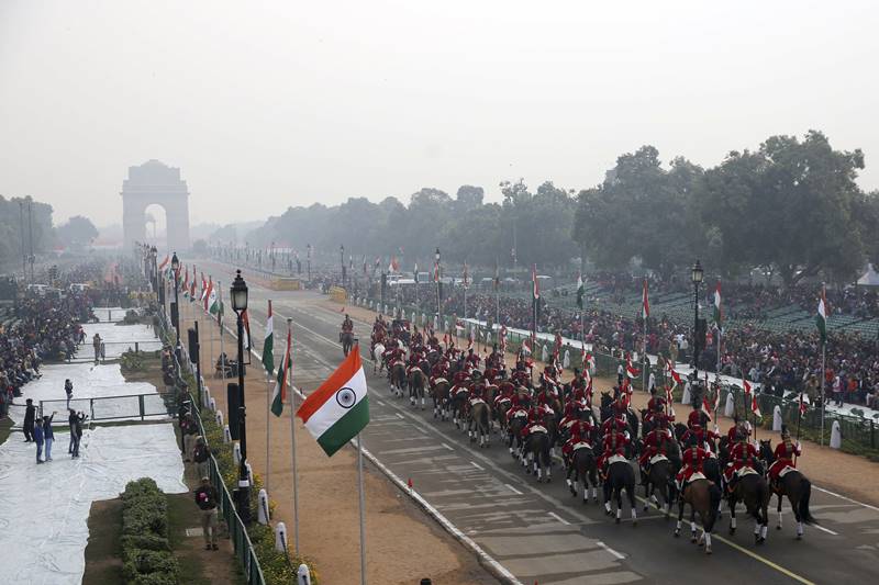 President's bodyguards on horse backs move through Rajpath, the ceremonial boulevard, during a full-dress rehearsal of the Republic Day parade in New Delhi. (AP Photo)