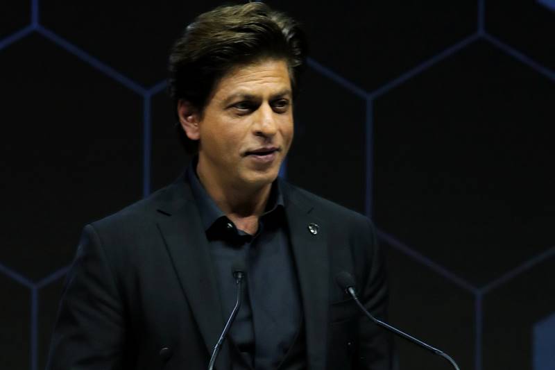 Earlier in the day, he also posed in his signature open arm style right after reaching Davos. (Image: Reuters)
