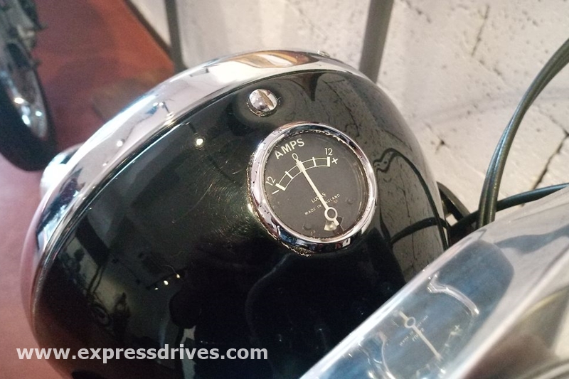 The company built the two variants of the Royal Enfield Interceptor in small numbers and finally, the production ceased in the year 1970. Here you can see the battery indication of the Royal Enfield Interceptor and it was located just over the headlamp.
