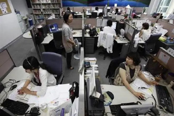Asia’s most overworked country succeeds in reducing work hours ...