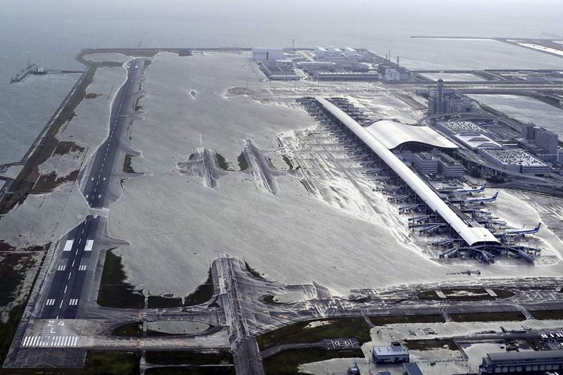 kansai airport japan, kansai airport, kansai international airport, kansai airport sinking, kansai airport japan photos, kansai international airport pictures, kansai airport images, japan typhoon, typhoon jebi