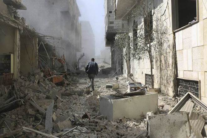 Syria, Iran accuse US of hindering political solution to Syrian crisis (AP Photo/ File)