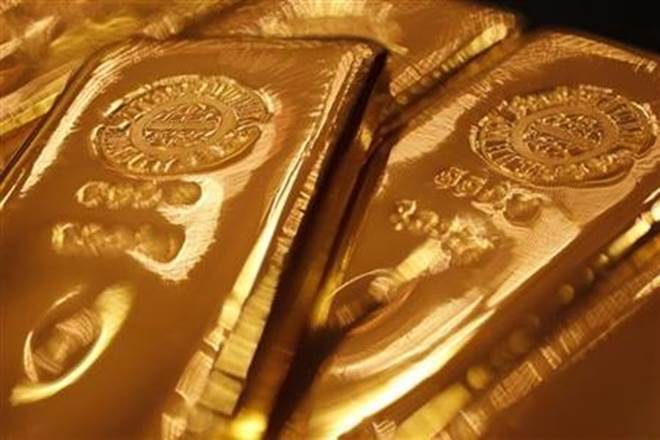 Gold inches lower as US-China trade talks boost risk appetite