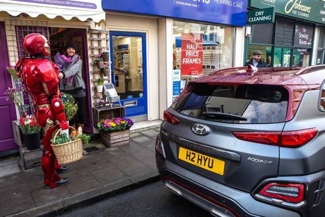 A regular day on the streets of West Country, England was disrupted a bit as Iron Man decided to do some grocery shopping on his day off. We don't expect Tony Stark to be fond of something like this, but Iron Man it seems likes the idea of buying his own KFC.