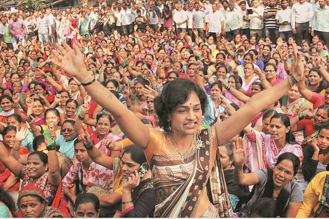 BJP workers celebrate the approval of 10% reservation for economically backward upper castes in govt jobs, in Mumbai (PTI)