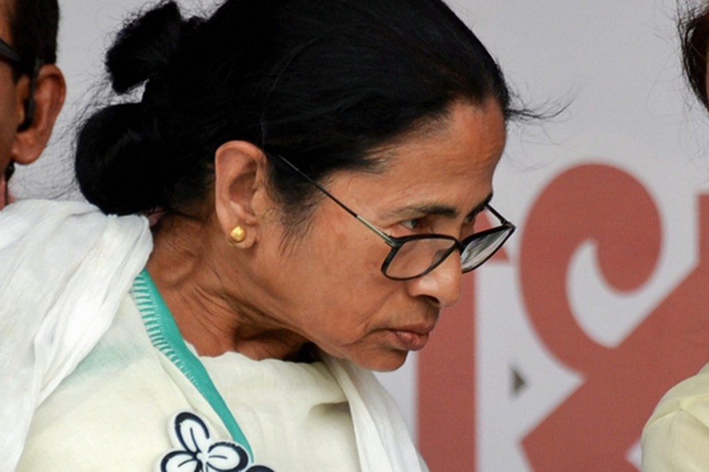 Asansol: West Bengal Chief Minister and Trinamool Congress chief Mamata Banerjee speaks with party candidate from Asansol seat Moonmoon Sen during an election rally for Lok Sabha polls, in Asansol, Friday, April 26, 2019. (PTI Photo) (PTI4_26_2019_000170B)