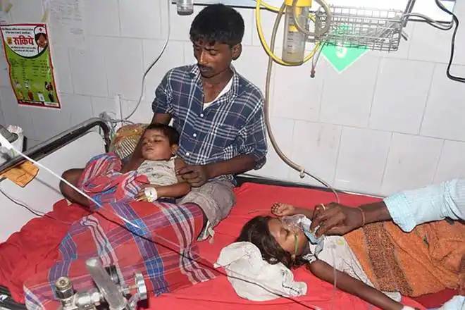 Children showing symptoms of Acute Encephalitis Syndrome (AES) being treated at a hospital in Muzaffarpur. (PTI Photo)
