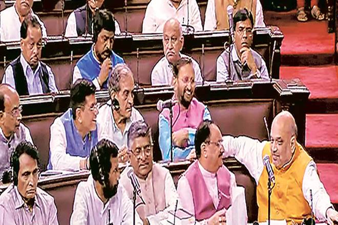 Union Ministers Amit Shah, Ravi Shankar Prasad and others in the Rajya Sabha on Tuesday (PTI)